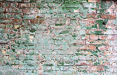 Background of old vintage dirty brick wall with peeling plaster Stock Photo