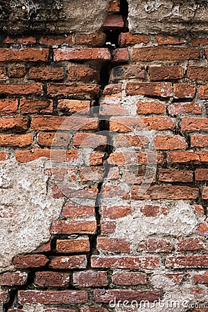 Background of old vintage dirty broken brick wall with peeling plaster, texture Stock Photo