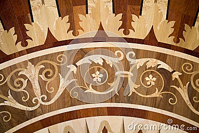 Background of parquet various wood figure large leaves flowers in whorls. Backgrounds Structure Stock Photo