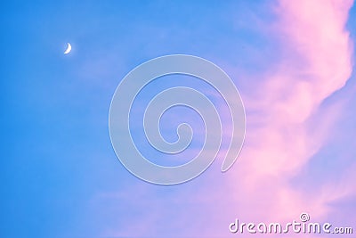 Background photograph of a red full moon in a blue sky at sunset Stock Photo