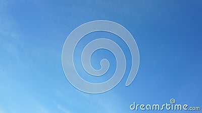 Background picture bright blue sky with thin white clouds Stock Photo