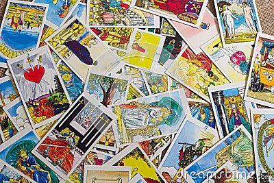 Background with pile of the tarot cards, the major arcana deck. Fortune telling seance or black magic ritual. Scary Stock Photo