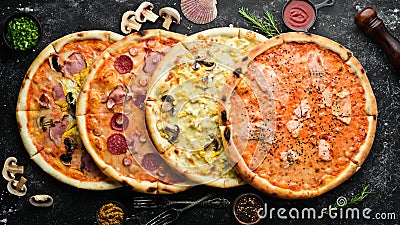 Background Pizza. Set of delicious pizzas with bacon, cheese and mushrooms. Stock Photo