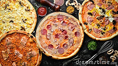 Background Pizza. Set of delicious pizzas with bacon, cheese and mushrooms. Stock Photo