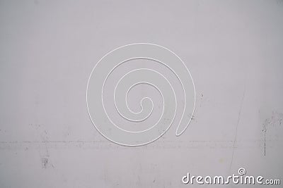 Background plastered cement dirty and marked white wall worn by time Stock Photo
