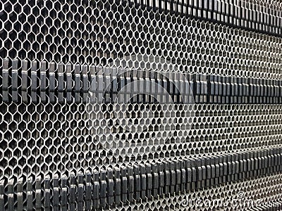 Background of the plate heat exchanger radiator grille Plate heat exchanger for heat transfer from a hot heat carrier to a cold me Stock Photo