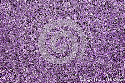 The background of polished granite in violet black shades. A background for design and creative work. Decoration and Stock Photo