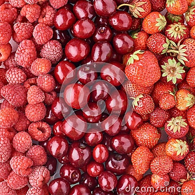 Background of a raspberry, cherry and strawberry, top view. Mixed berries Stock Photo