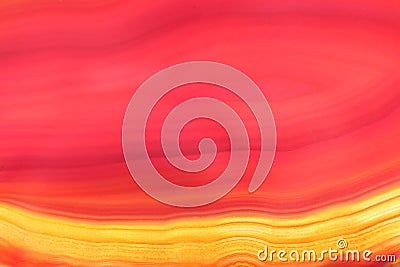 Background of red and yellow colored translucent agate stone Stock Photo