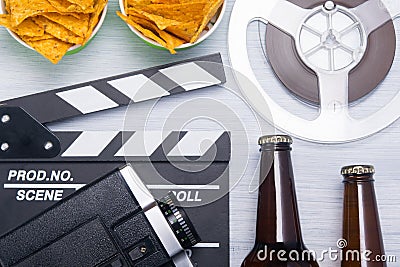 background for relaxing while watching a movie with beer and snack on a light background Stock Photo