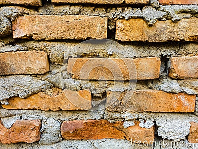 a background with a repeating pattern of a brick wall surface Stock Photo