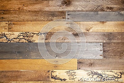 Background - repurposed wood planks- a few have unusual fractal lightning high voltage lichtenberg wood burning patterns Stock Photo