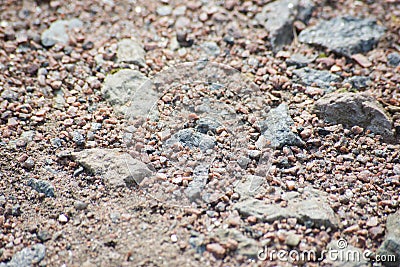 Background of a road of small pebbles and stones, close Stock Photo