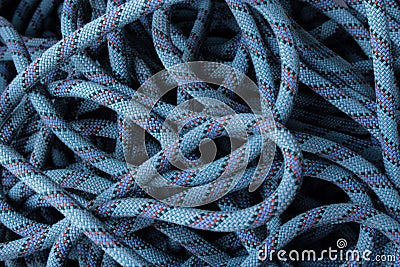 Ropes for climbing activities in vertical terrain, blue karmantel rope Stock Photo