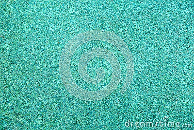 Background of rubberized coating used on children`s and sports grounds turquoise. Backgrounds texture Stock Photo