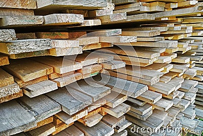 Background of sawn boards in a stack. lumber Stock Photo