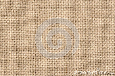 A background of a scratchy burlack material in an even light brown color. Stock Photo