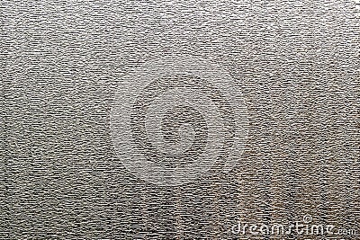 Background of silvery shiny foil with fine horizontal stamping Stock Photo