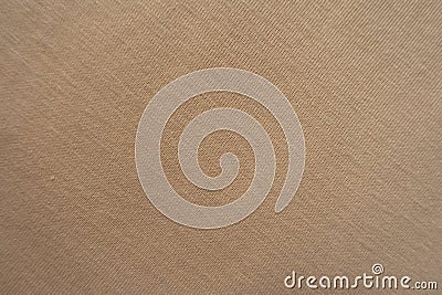 Background - simple beige jersey fabric from above Stock Photo