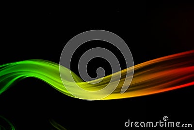 background smoke curves and wave reggae colors green, yellow, red colored in flag of reggae music Stock Photo