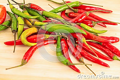 Background spicy vegetable red green chilli many pods ingredients asian cuisine Stock Photo