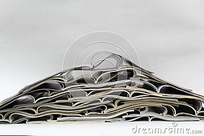 Background a stack of open glossy magazines, press Stock Photo