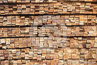 Background of Stacked Wood Cut in Squared Timber Stock Photo