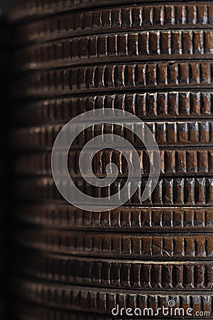 Background from stacks and edges of US coins of 15 cents in circulation. Wall of American quarters close-up. Dark atmospheric Stock Photo