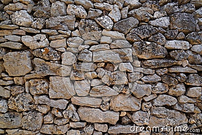 Background stones hands mason made wall vintage facade wall stone wallpaper Stock Photo