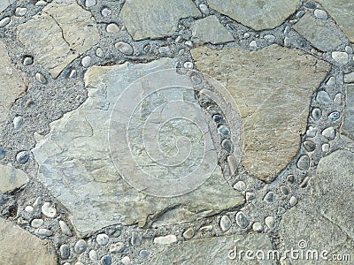 Background texture of ancient round gray stone floor Stock Photo