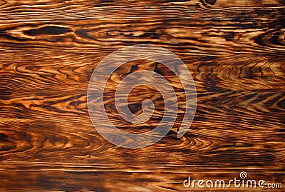 Background texture from burned brown pine wood Stock Photo