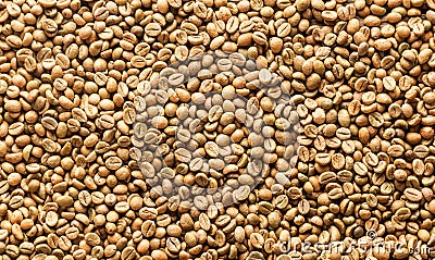 Background texture or fresh raw dried coffee beans Stock Photo