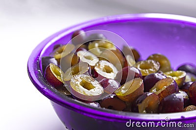 Background texture plum blue half color on white in a circle fruit sweet matte beautiful juicy Stock Photo