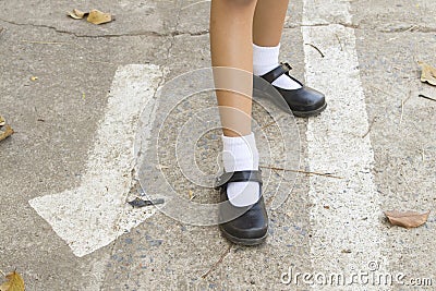 Background textured surface cement on the floors with shoes girl walking Stock Photo