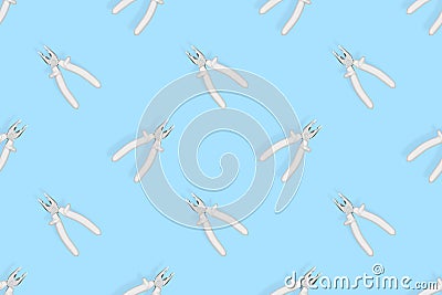 Pliers seamless pattern. Metal pliers with rubber grips. Stock Photo