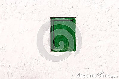 background of traditional green farmhouse window in Lanzarote at white historic vintage wall Stock Photo