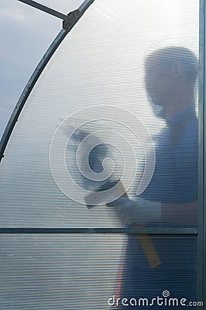 on the background of transparent polycarbonate, it should work for the collection of greenhouses Stock Photo