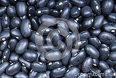 Background - uncooked black mexico beans Stock Photo