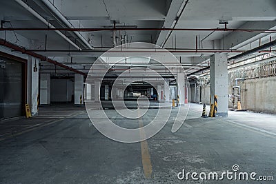 old parking lot with lighting, concrete building Stock Photo