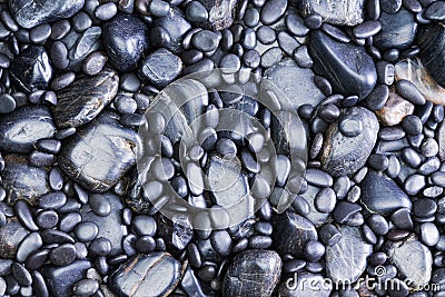 Background View of Black River Rocks Stock Photo