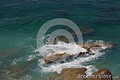 Background View at Cape Trafalgrar turquoise sea ocean white foam Stock Photo