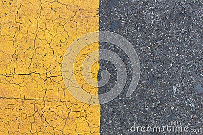 Background of yellow black strips . Dark grey asphalt road divided by yellow pain Stock Photo