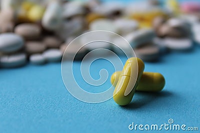 Medical yellow capsules for the treatment of disease Stock Photo