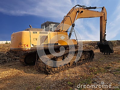 Backhoe to adjust the soil to prepare. Stock Photo