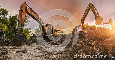 Backhoe to excavate the soil on the ground construction site Stock Photo
