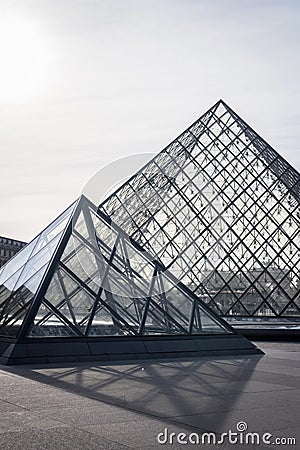 The Louvre Pyramids in Paris Editorial Stock Photo