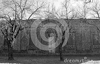 Backlight shot of an old brick house of Italian immigrants in the rural agricultural areas of Argentina Stock Photo