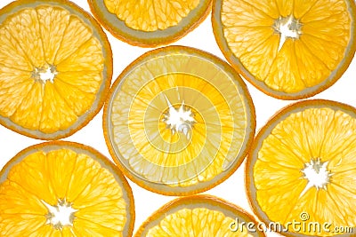 Backlit orange slices on a white background Stock Photo