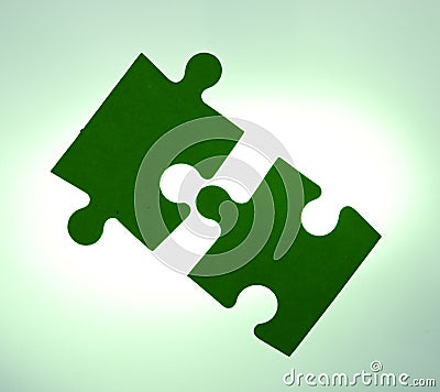 Backlit puzzle pieces - solution concept Stock Photo