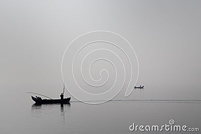 Traditional fishing boats during toil Stock Photo